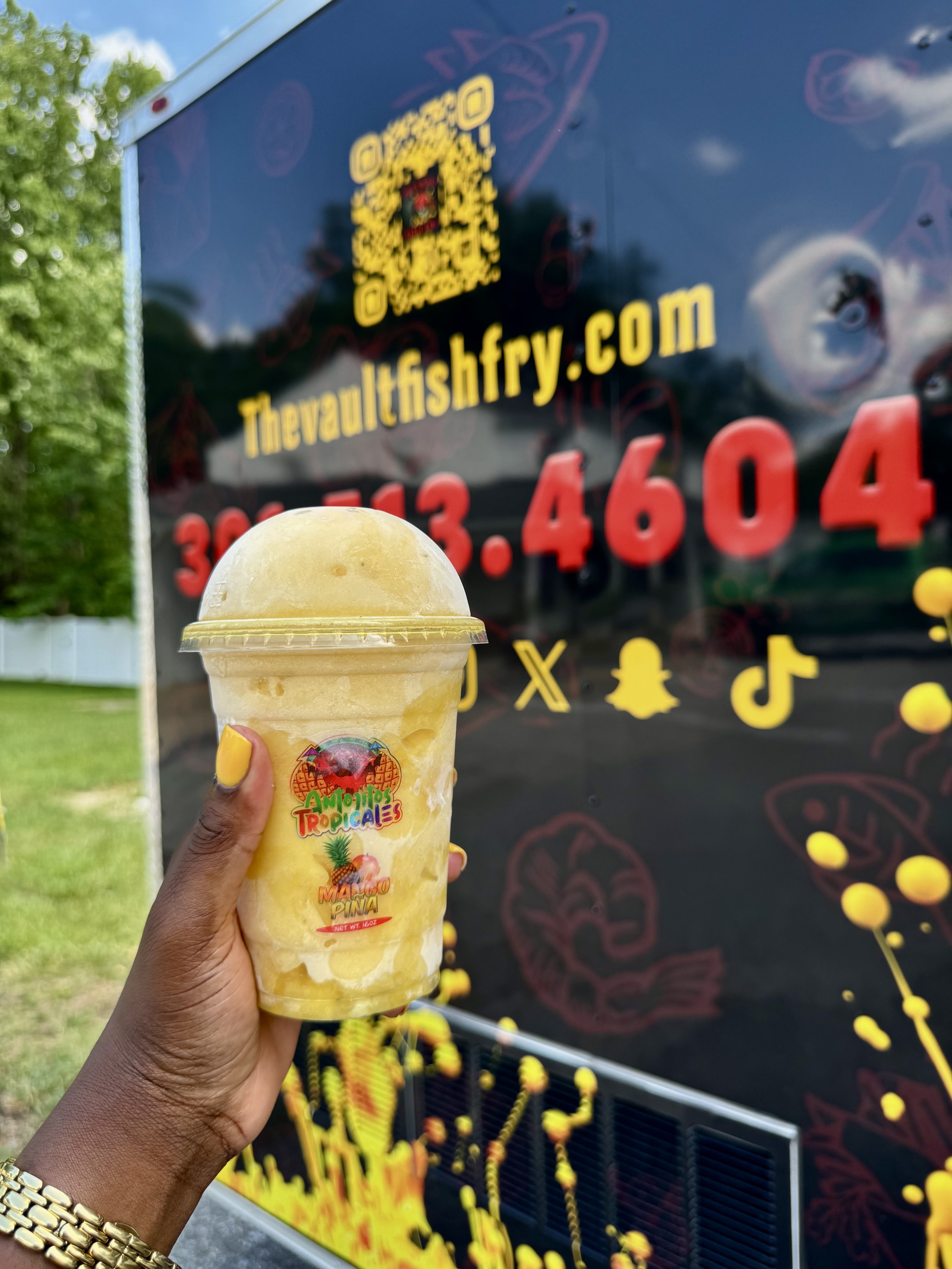 Tropicales drink in front of the truck