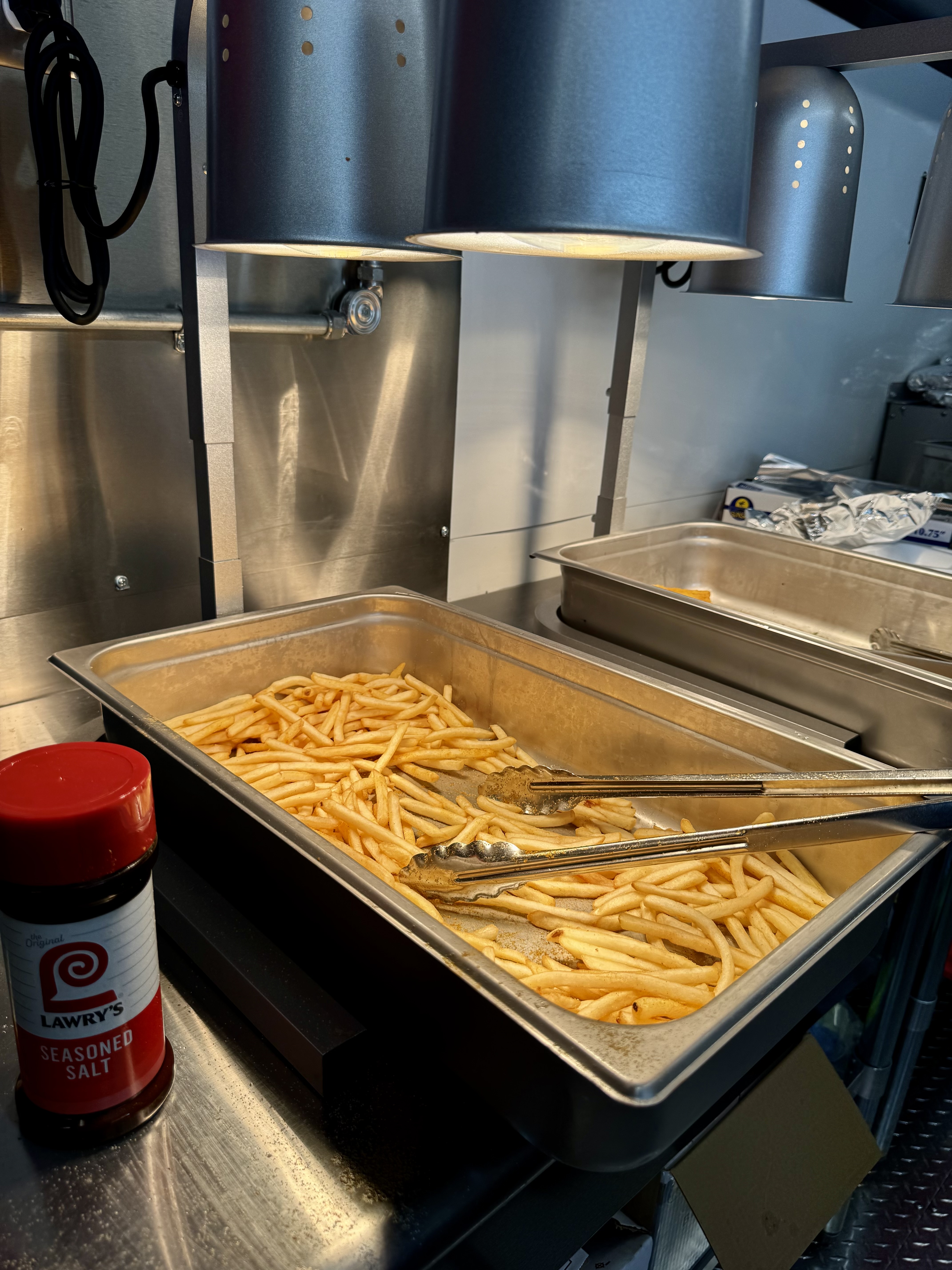 Fresh fries under the heat lamps